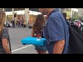 coach kenzow plays west african guitar on the streets of montreal