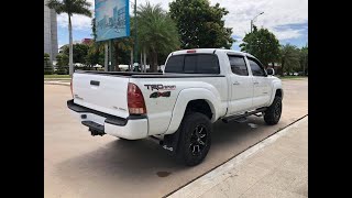 Toyota TACOMA ពណ៌ស សេរីឆ្នាំ2006ប៉ុង២ ទ្រុងវែង វល្លីមចង្កូត