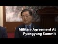 Two Koreas adopt military agreement