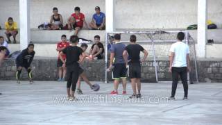 McLeod Ganj  - Teenagers playing a game of football in the Himalaya