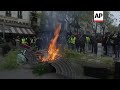 paris protesters build barricades and set fires