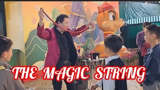 THE MAGIC  STRING  TAKE TWO BY THE WONDERS MAGICIAN