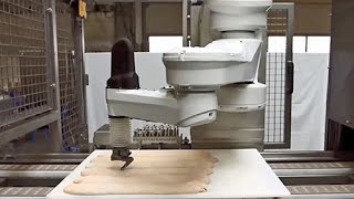 Stäubli FAST picker TP80 robot in bread scoring application