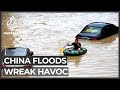 'Grim': China battles record flooding after torrential downpours