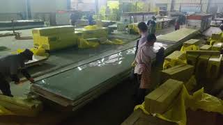 Handmade rock wool core sandwich panel production.