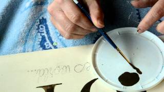 how to paint small script letters on signs