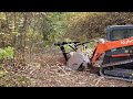 demo video showing the kubota svl and the fae mulcher clearing brush.