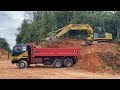 EXCAVATOR LOADING  TRUCK