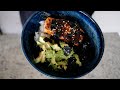 slightly burnt salmon teriyaki with avocado and rice