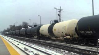 CSX 5366 leads NS duo on EB oil train past Downers Grove