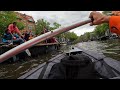 koningsdag 2022 amsterdam king’s day filmed from a kayak. a girl felt from the boat into the water