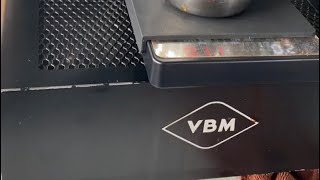 Barista trying  latte art from the VBM Espresso Machine