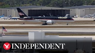 Trump's plane lands in New York ahead of court date