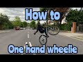 How to do a one hand wheelies