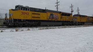 UP 3092 a SD70AH leads a manifest west through Geneva IL