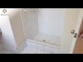 full bathroom renovation install 300x600mm tile 25