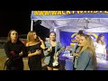 Teens Having Fun With Wacky Whistles