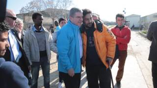 IOC Thomas Bach President visits refugees in Athens