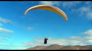 paragliding above the  Legzira beach in south Morocco