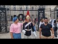 Tourist touches the plume on the back of the kings guard head and gets a close shave #thekingsguard