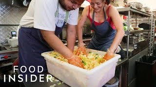 Chefs Climb Onto A Table To Make 50 Pounds Of Kimchi