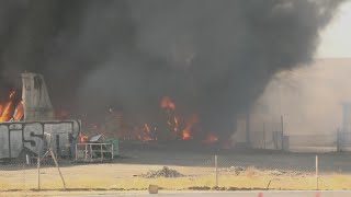 Massive fire breaks out at warehouse near Downtown Fresno