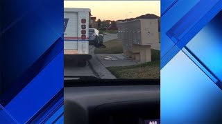 Residents catch postal working throwing mail on ground