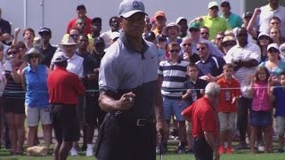 Tiger Woods grinds out a big par save at Wyndham
