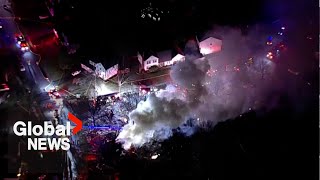 Virginia house explosion: 1 firefighter killed, multiple people injured, police say
