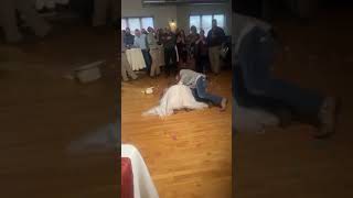 Bride and Groom Making Entrance Loses Footing and Crashes Together - 1449048