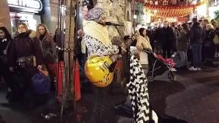 Very talented female busker at London Chinatown