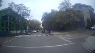 DRUNK OR HIGH CYCLIST RUNS A STOP SIGN