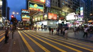 busy pedestrian crossing on nathan road kowloon hong kong china t lapse  JzP8X1Nr