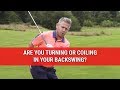 Are You Turning Or Coiling In Your Backswing? - Golf Swing Tips - DWG