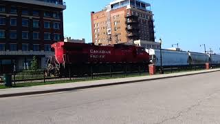 CP 9371 long hood forward leads a freight Muscatine, IA