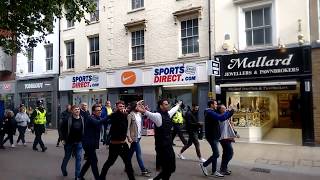 Lincoln Football Fans Make Some Noise In Peterborough City Centre