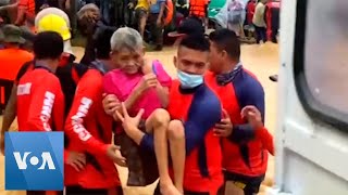 Filipino Coast Guard Rescue Locals From Typhoon Floods