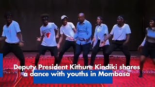 Deputy President Kithure Kindiki shares a dance with youths at the Swahili Pot Hub in Mombasa