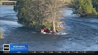 Rafters caught on island in American River