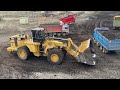 Caterpillar 992G Wheel Loader Loading Coal On Trucks With One Pass - Mega Machines Movie