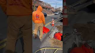 Flagman on site is priority on busy streets while sewer line is being installed