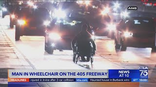 Man in wheelchair on 405 Freeway