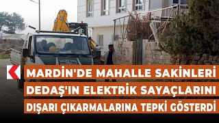 Mardin'de mahalle sakinleri DEDAŞ'ın elektrik sayaçlarını dışarı çıkarmalarına tepki gösterdi