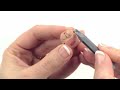 Unitron Insera – Unitron Insera - How to use the battery door removal tool