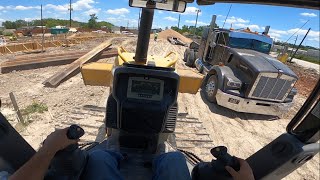 POV Heavy Haul trucker, kenworth hauling CAT D3 dozer with RGN lowboy