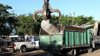 Unloading scrap ready for shredding and cutting at King Brother recycling center in MIAMI!!!!