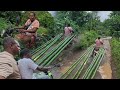 Getting bamboo for the decking through mud and water | nuff rain