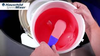 Mixing of 2,5kg up to 5kg of putty with red pigments on a Hauschild SpeedMixer DAC 5000