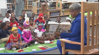 WSAV's Kim Gusby reads to students at Hodge Elementary School