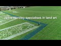 uk artist makes giant nhs logo field art in support of health workers afp